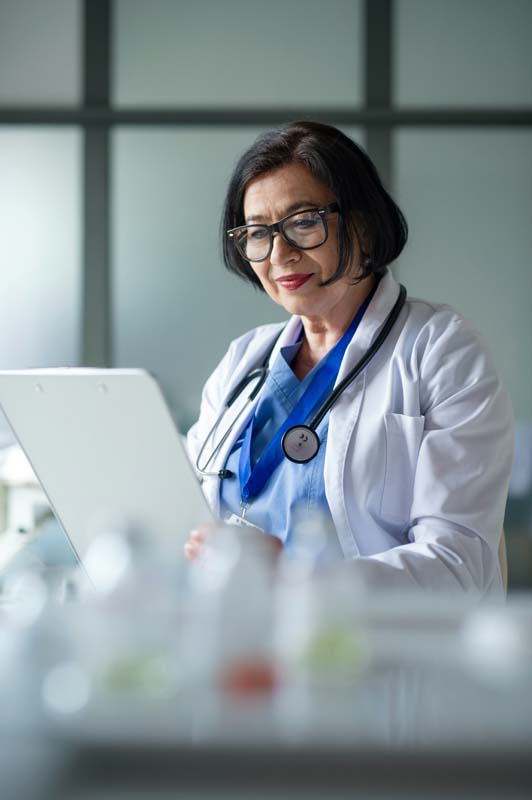 female doctor reading